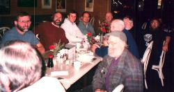 toward the head of the table
