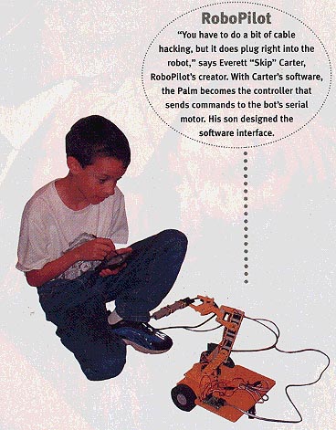 Photo of Skip's son using Palm controlled robot